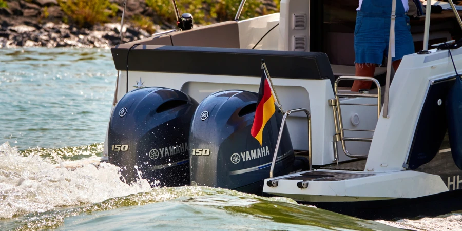 Yamaha outboard engines at the stern of a small motor boat for excursions