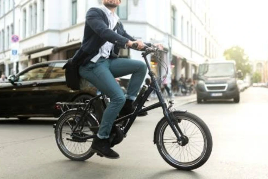 A man riding an electric bicycle