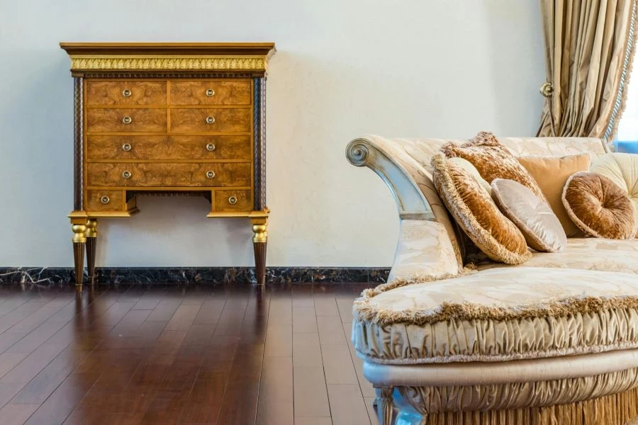 A vintage chest and settee in a living room