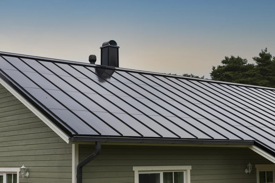 Building with solar metal roofing