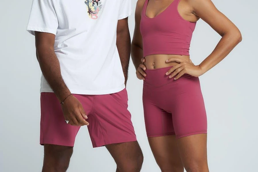 Couple wearing matching athleisure outfits