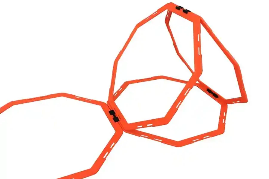 Elevated orange and black volleyball target in rounded shape