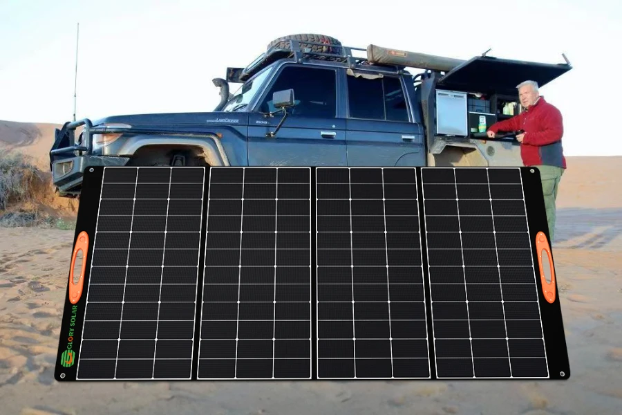 Foldable solar panels in use at a camping site