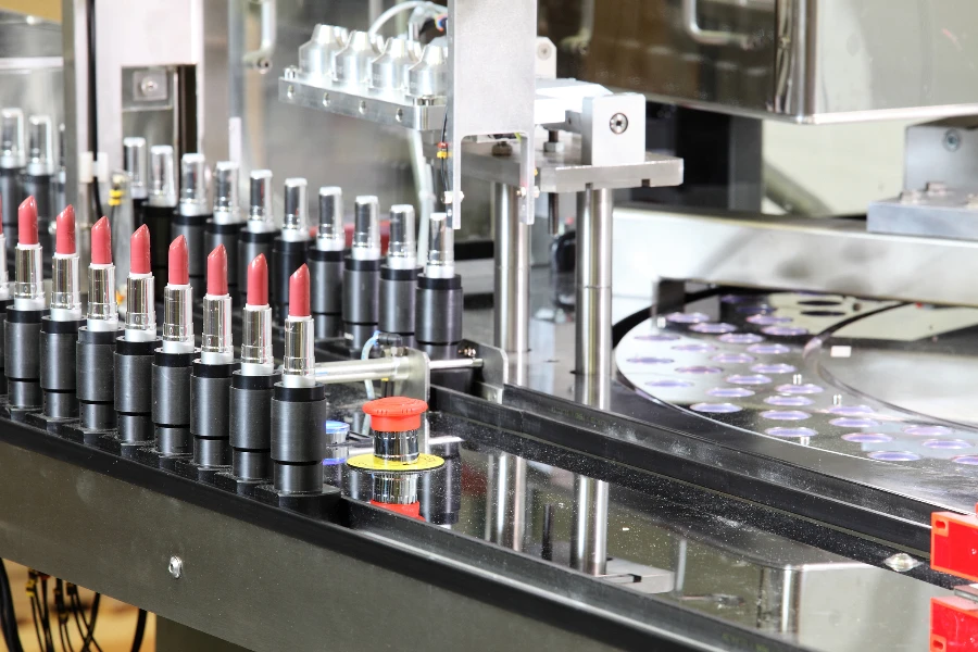 Lipstick packaging machine in a factory