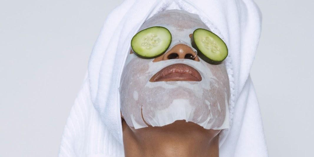 Top 5 Facial Mask Materials To Know In 2024 Alibaba Com Reads   Person Wearing A Facial Mask And Cucumber Slices 