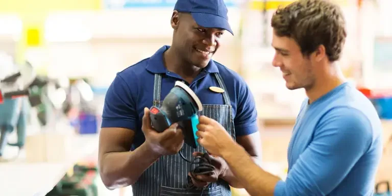 Showing customer a sander