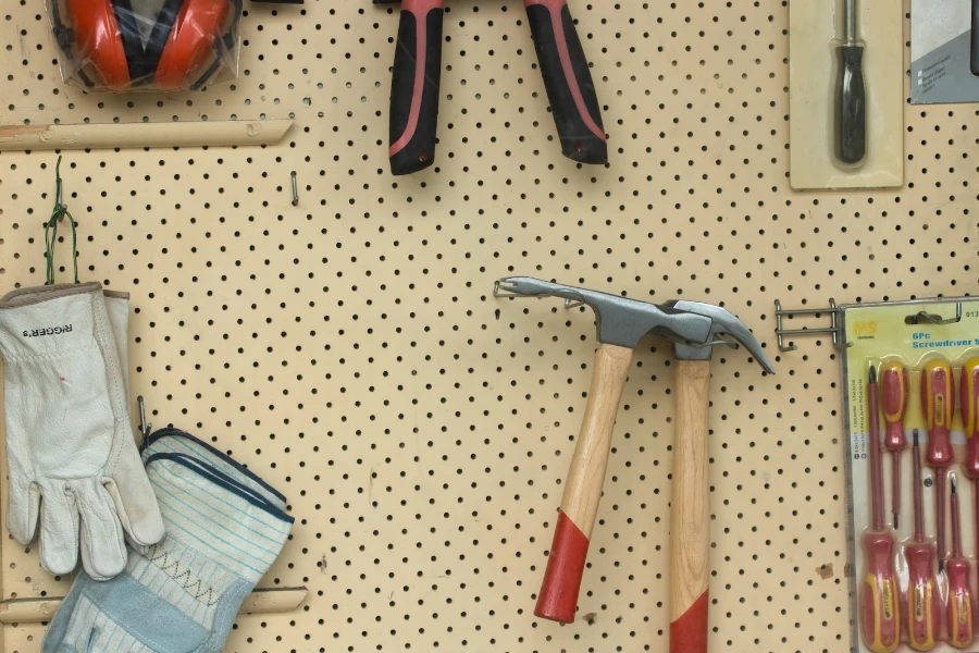 Various tools including a hammer and work gloves