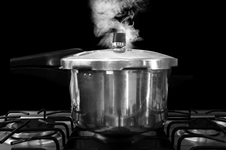 A pressure cooker pot on a stove