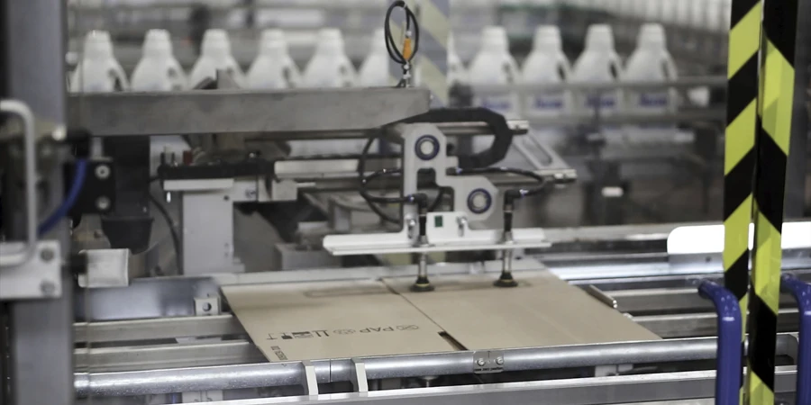 Cardboard boxes on conveyor belt in factory