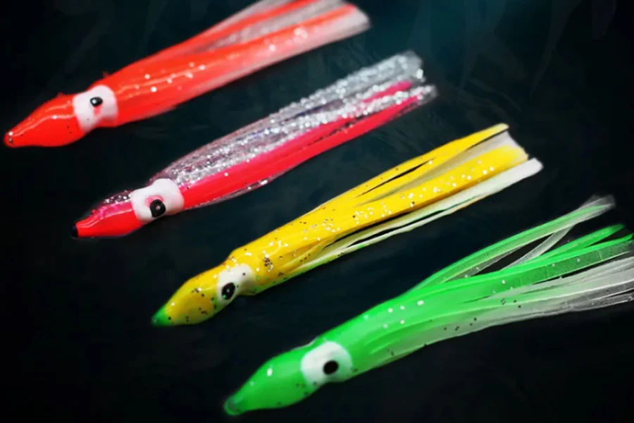 Maßgeschneidertes Trolling-Angeln aus weichem Kunststoff mit Krakenröcken und leuchtenden Tintenfischröcken. Angelköder Tintenfischköder