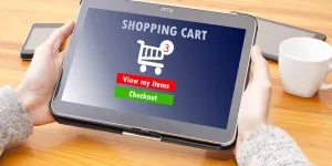 Hands with tablet and online shopping