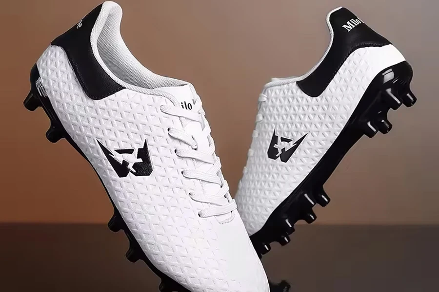 Botas de fútbol de hombre de alta calidad para césped artificial