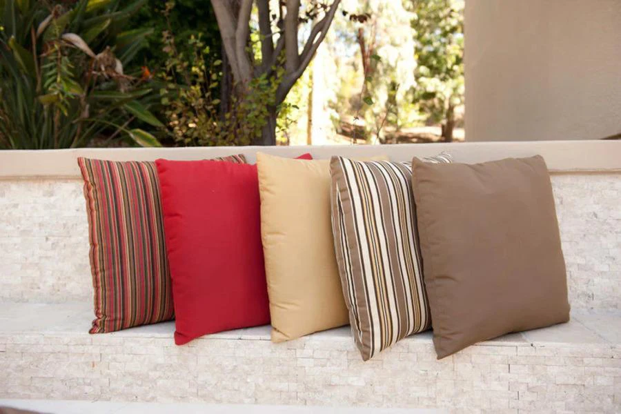 Outdoor pillows arranged on a patio