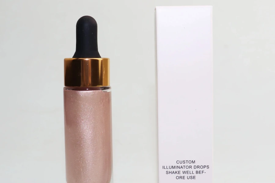 A bottle of liquid highlighter next to its packaging