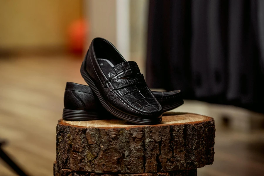 A pair of black leather loafers