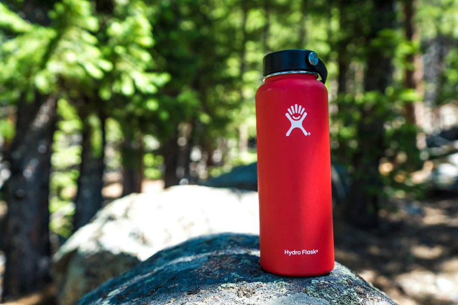A red and black reusable water bottle