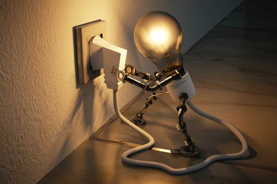 Eine animierte Glühbirne, die ein Kabel einsteckt