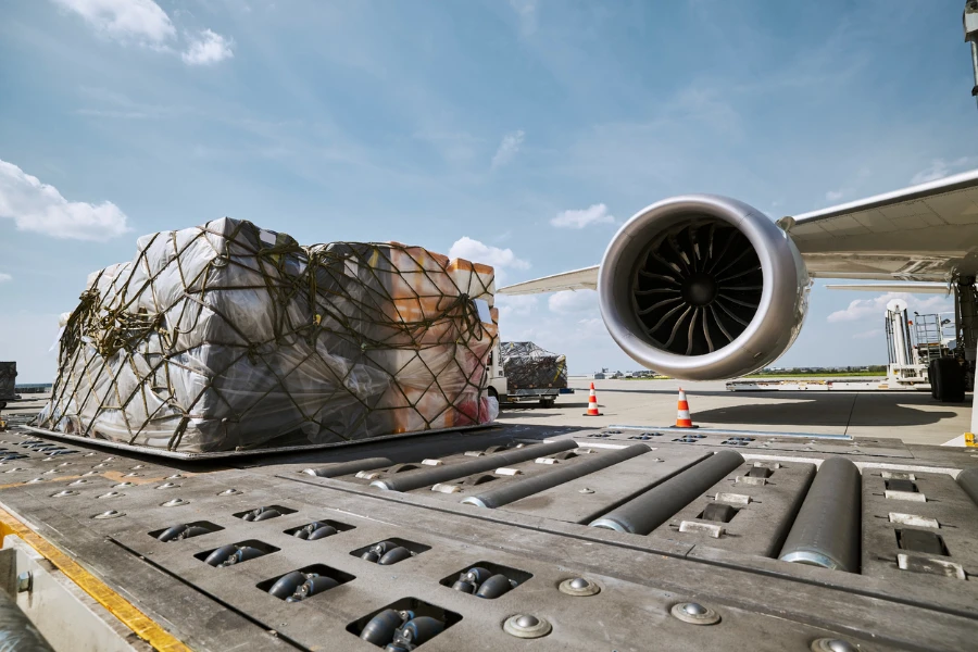 Cargo next to jet engine of an airplane