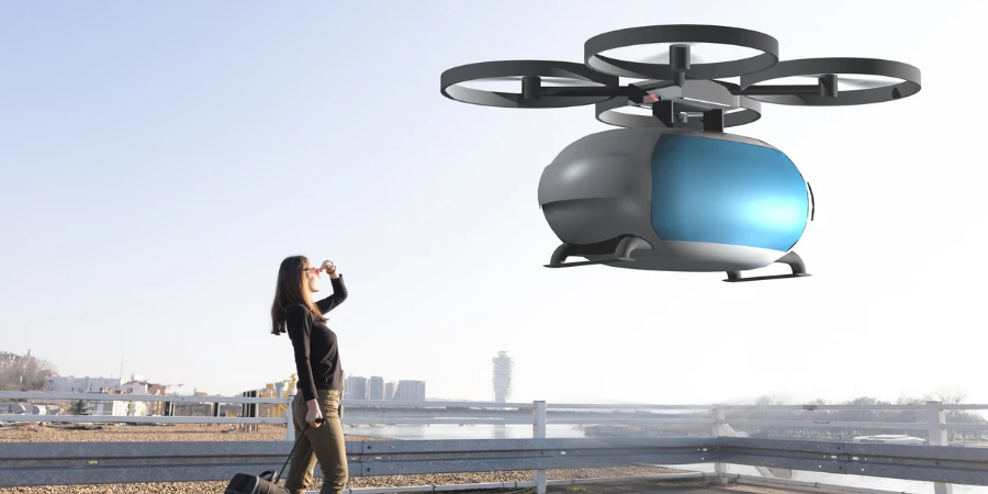 drone di trasporto volante che prende a bordo un passeggero