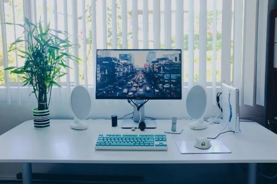 Home office with white vertical window blinds