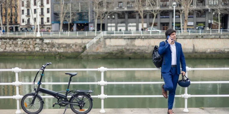 making phone call by riverside
