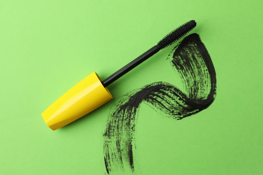 Mascara wand with yellow handle