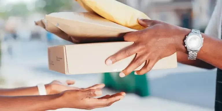 Person delivering items to another person