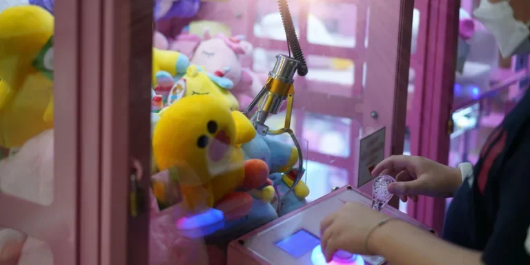 playing the doll machine