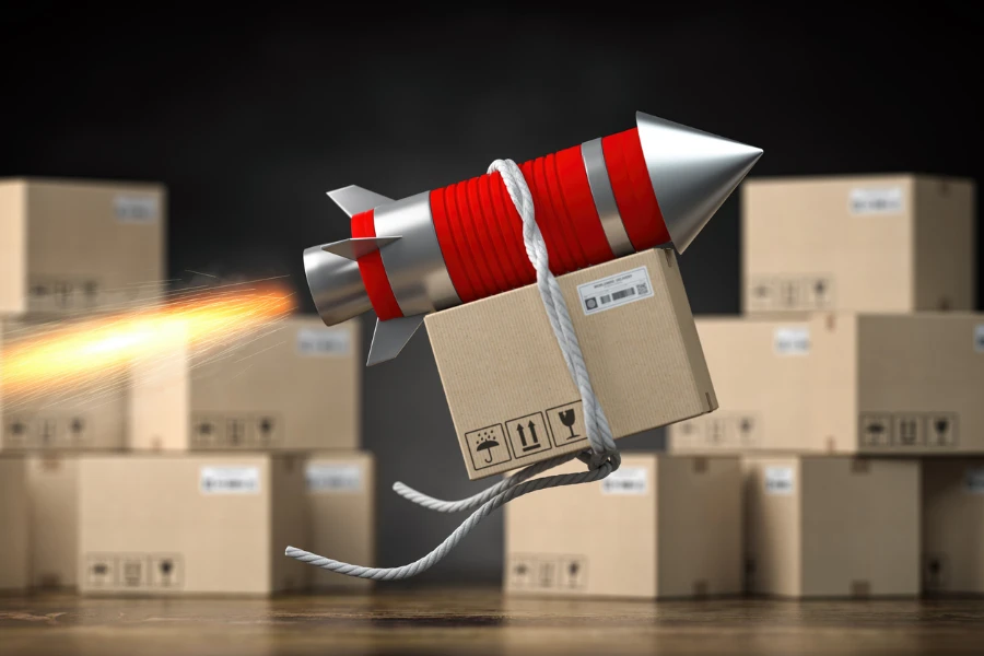 Rocket with cardboard box concept of fast delivery