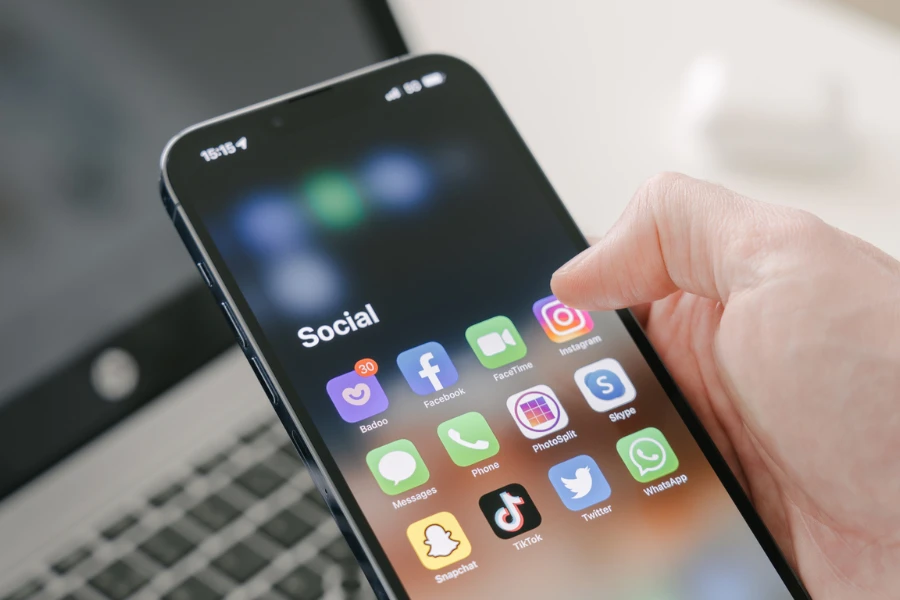 Social media platform icons on a smartphone