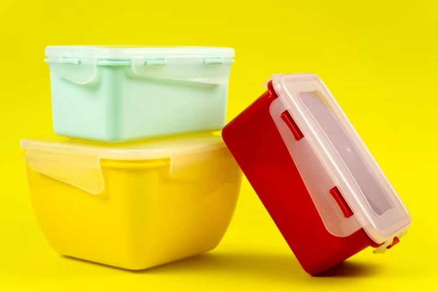 Three ceramic storage containers in different colors