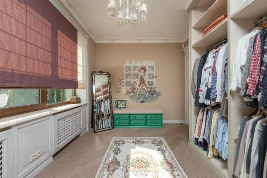 Walk-in closet with fabric Roman shades