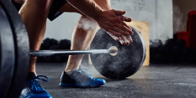 weightlifter clapping hands