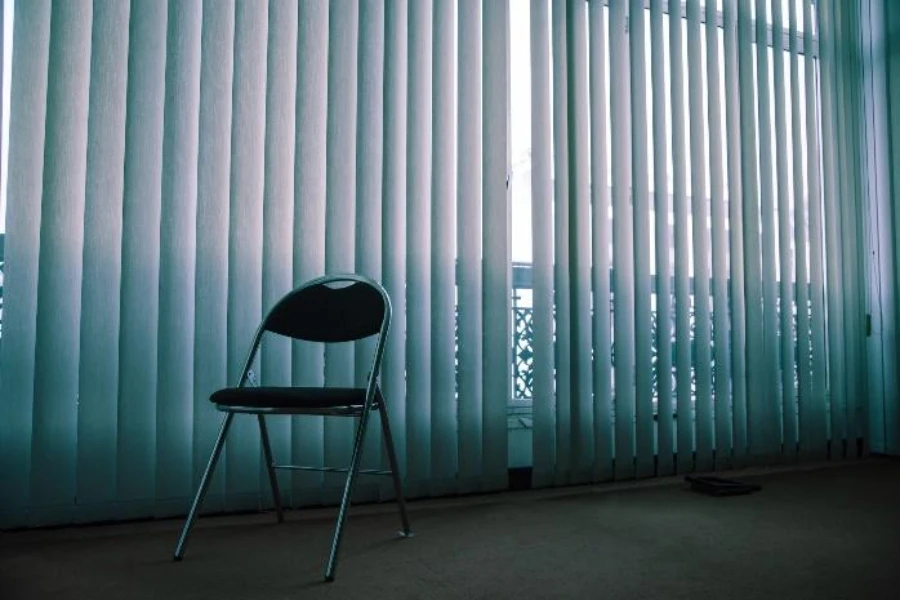 White vertical blind slats for floor-to-ceiling window