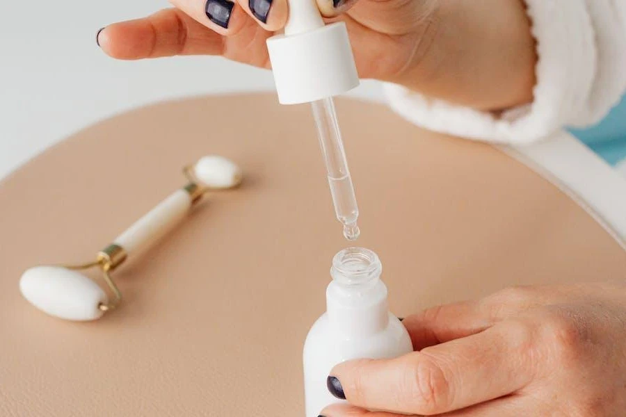 Woman preparing a face serum