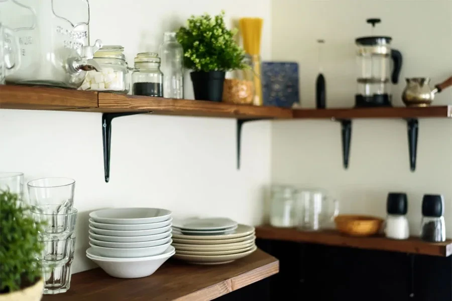 A corner shelve with kitchen utensils