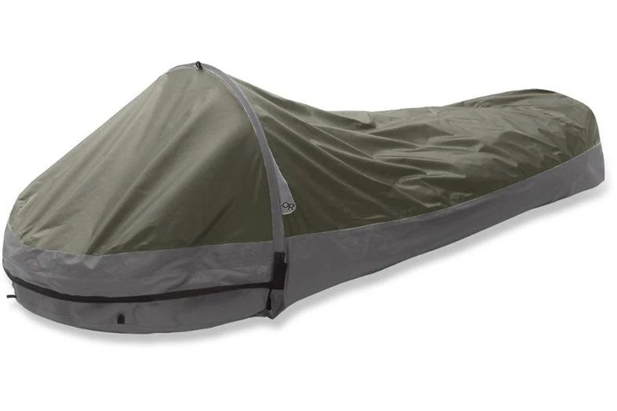 A green bivy bag on a white background