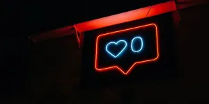 A heart and zero neon light signage