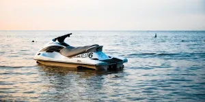 A jet ski floating alone in an ocean
