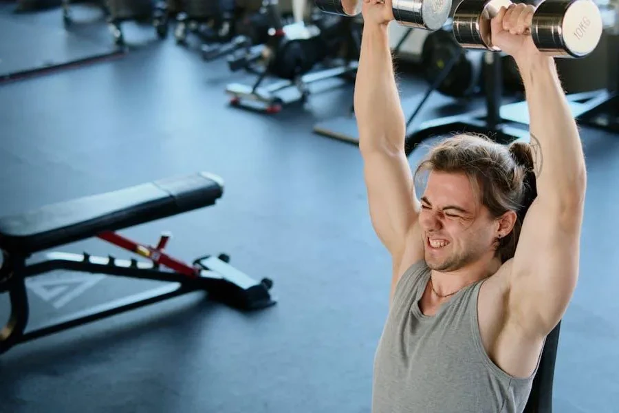 A man engaging in strength training on an adjustable bench