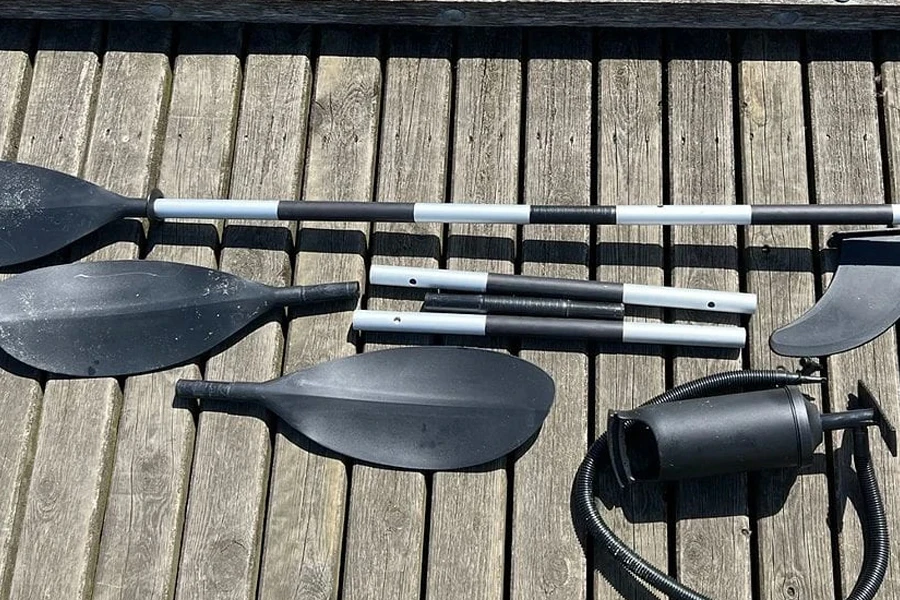 A one-piece and multi-piece paddle on a deck
