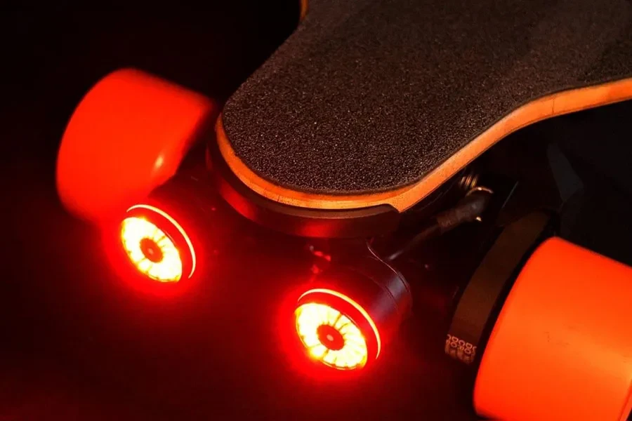 A skateboard with red tail light