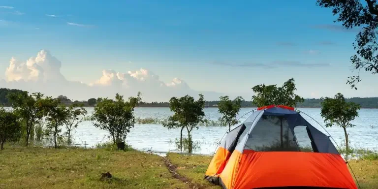A tent set up near a beautiful natural view