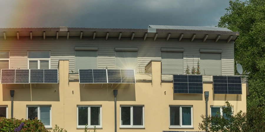 A terraced house with solar power plant on a balconies