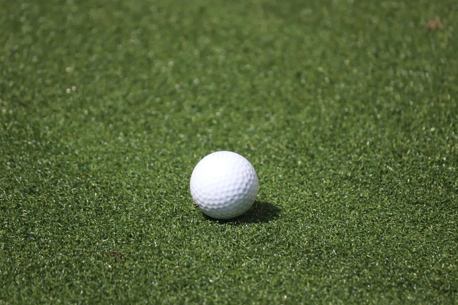 A white one-piece golf ball