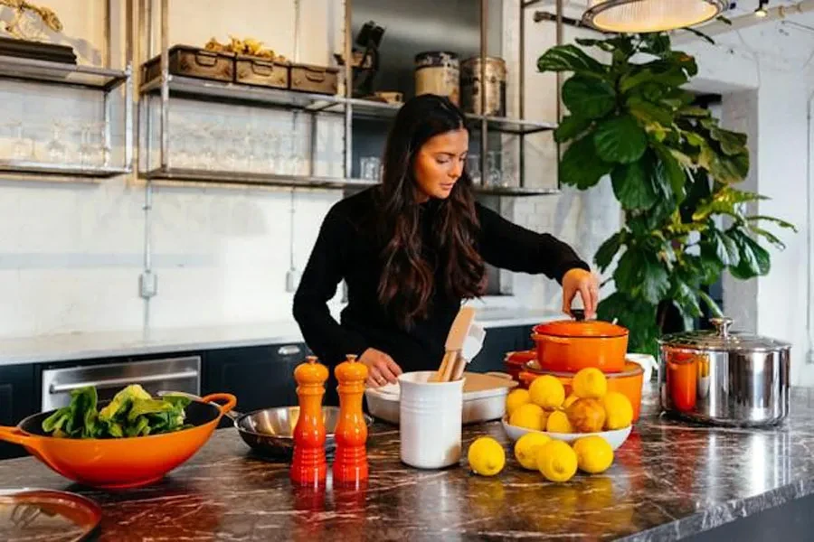 A woman cooking in a kitchen