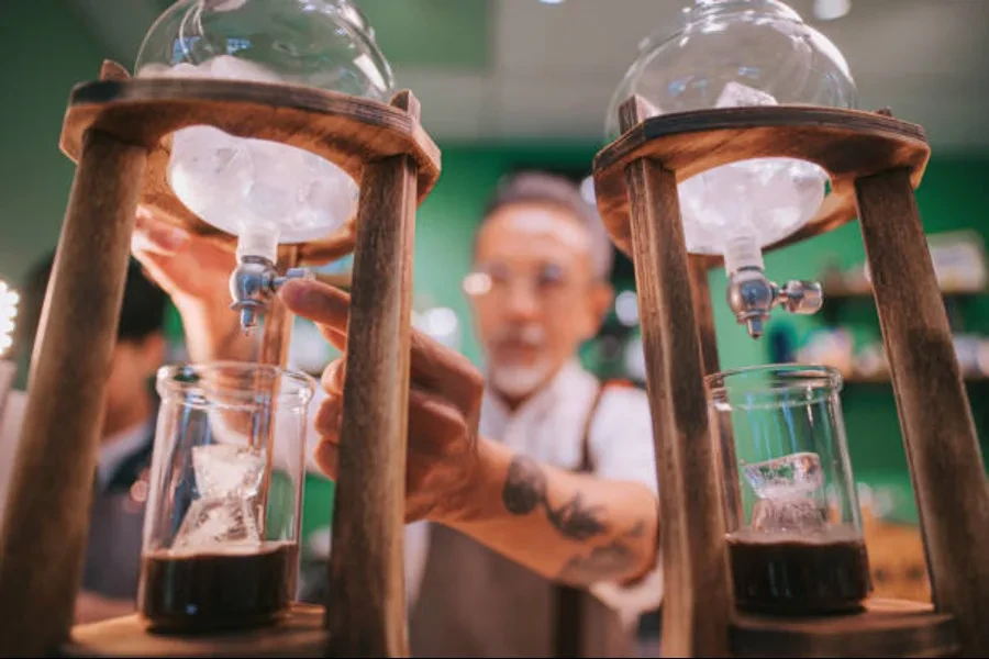 An old man brewing cold coffee