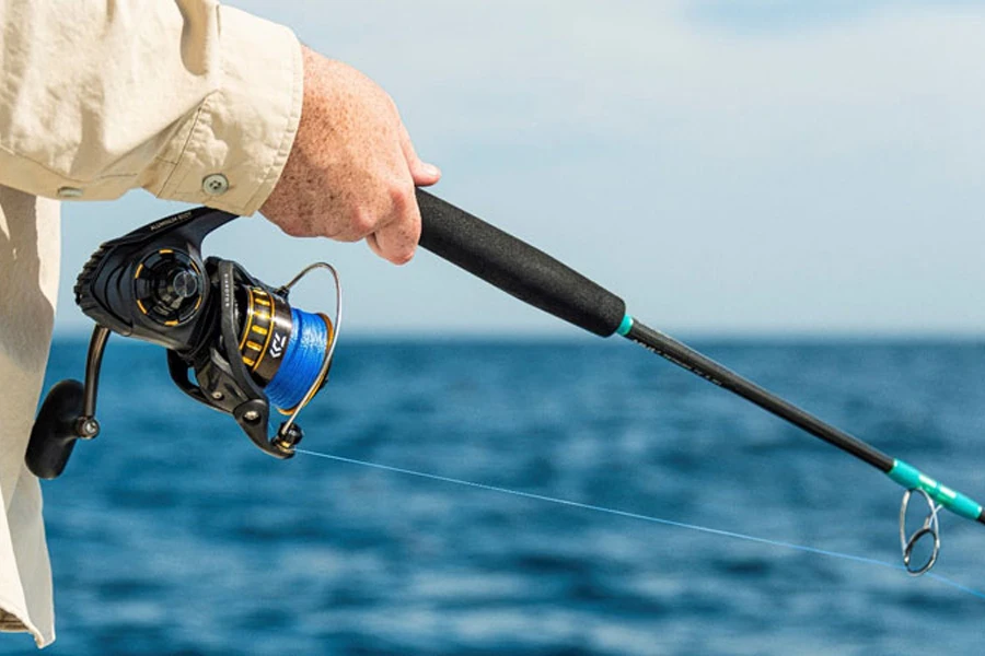 Angler using a black fishing rod