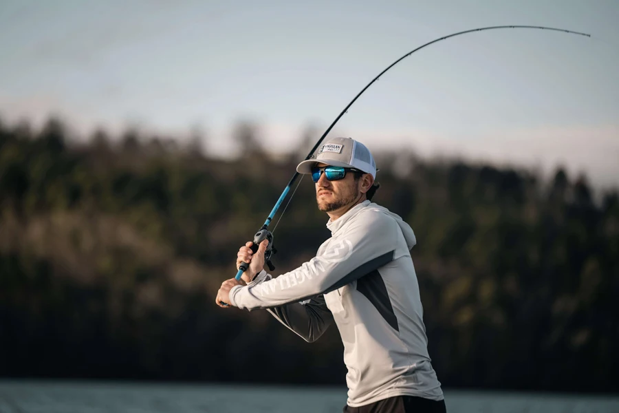 Angler using a casting fishing rod