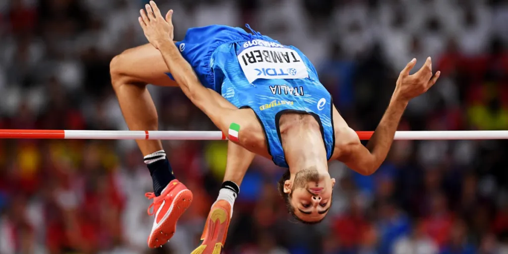 Athlete successfully completing a high jump